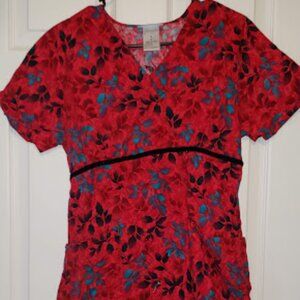 Women's scrub top with tie in back and two front pockets